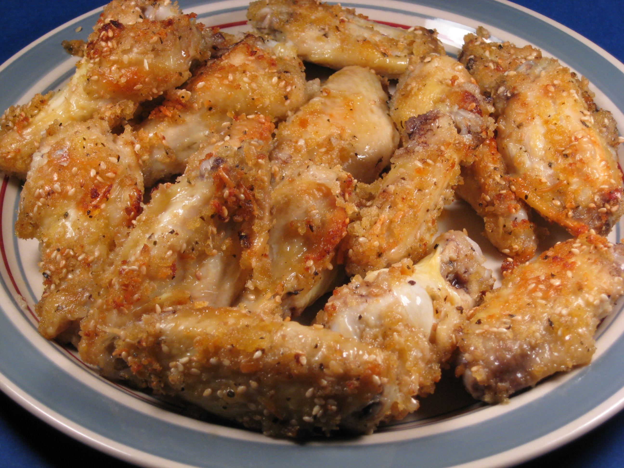 BAKED SESAME PARMESAN CHICKEN DRUMSTICKS (OR WINGS)