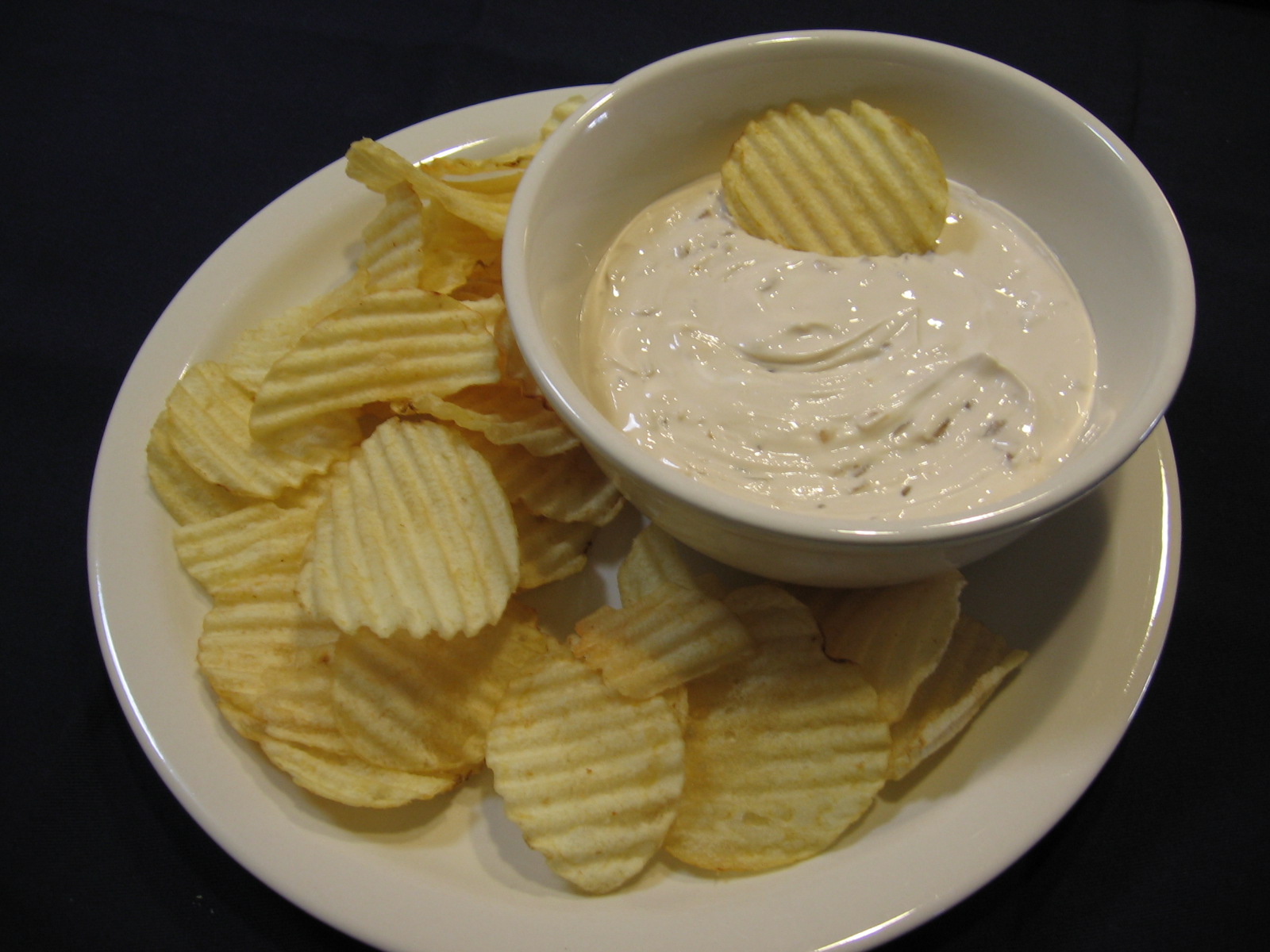 Celery and onion dip with prawn crackers