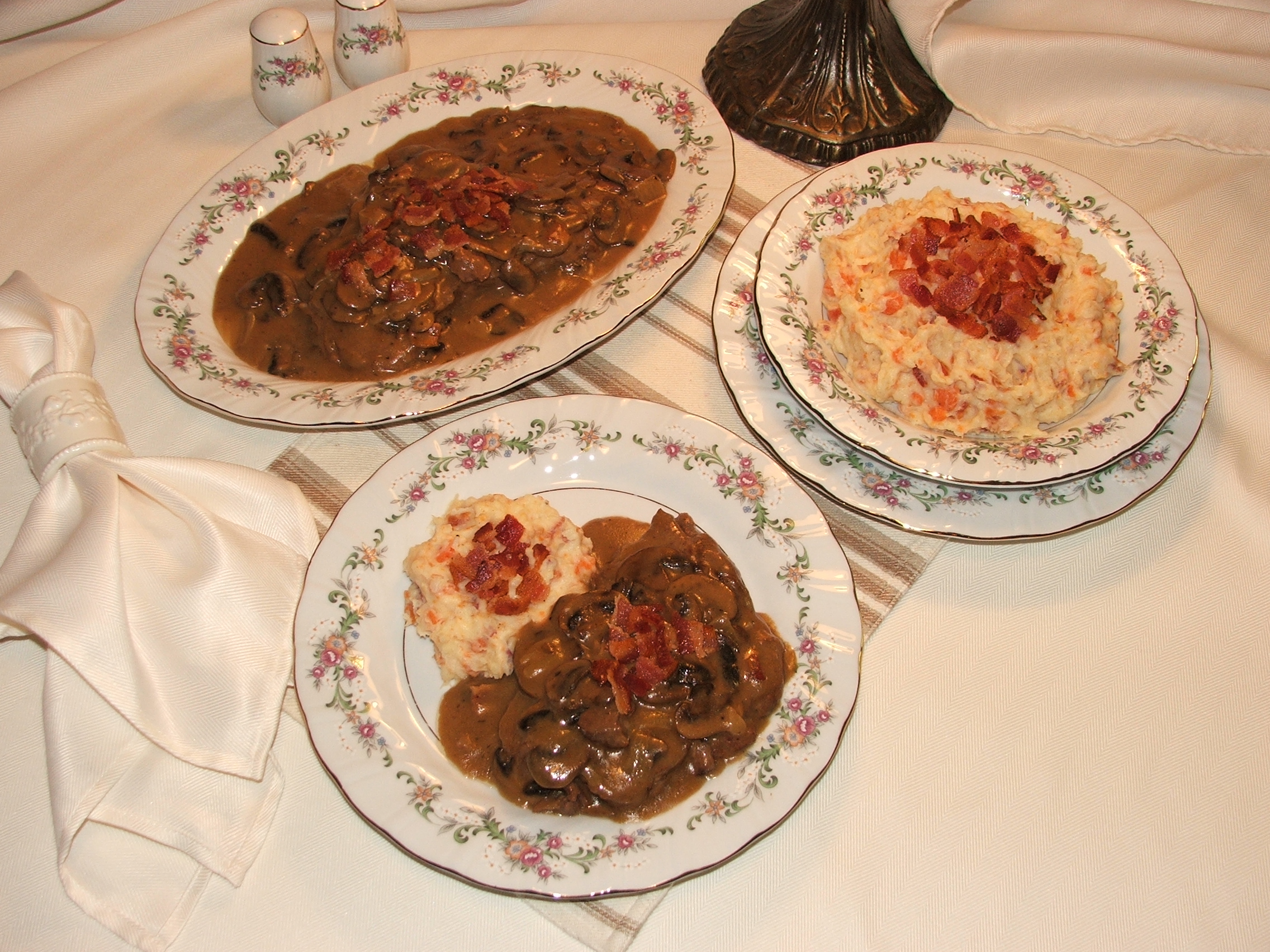 MUSHROOM-SMOTHERED SWISS STEAK