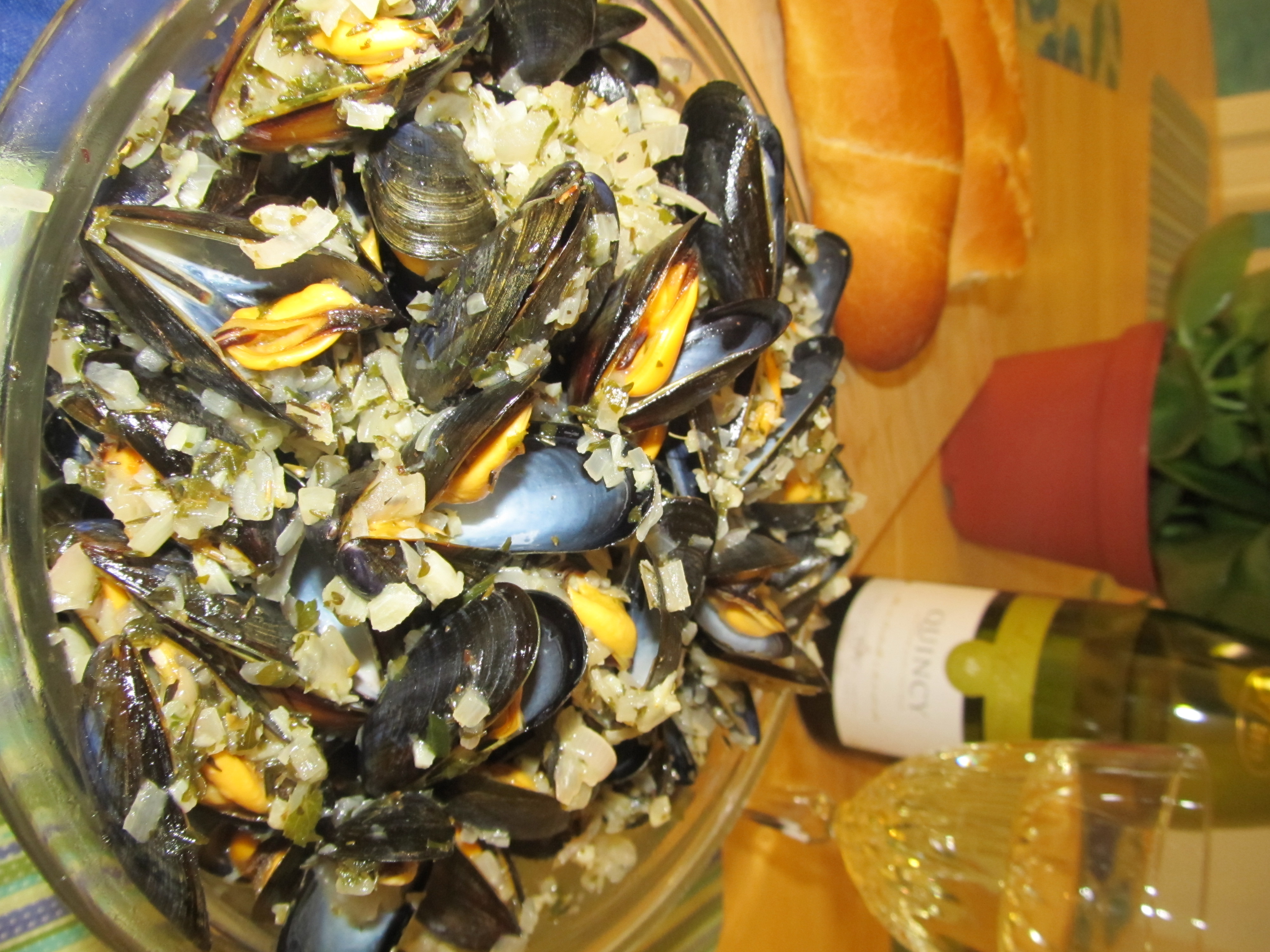 GARLICKY MUSSELS IN A RICH LEMON, FRESH HERB, BUTTER SAUCE