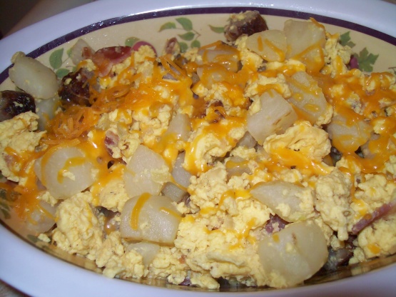 Scrambled Eggs Bacon, Potatoes, Peppers And Onions And 