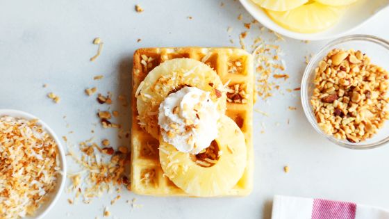 Pineapple slices, toasted coconut, whipped cream & chopped nuts