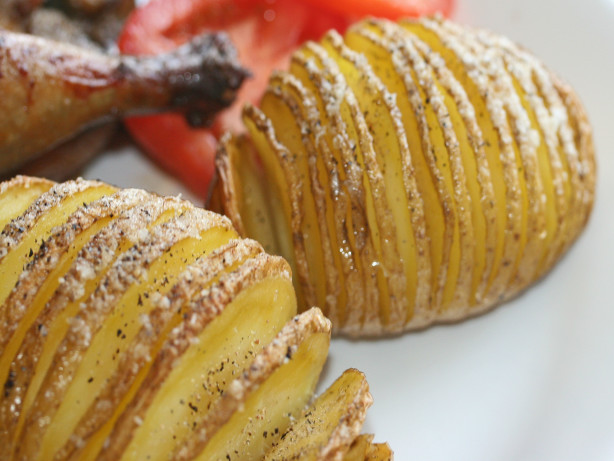 Garlic Hasselback Potatoes with Herbed Sour Cream